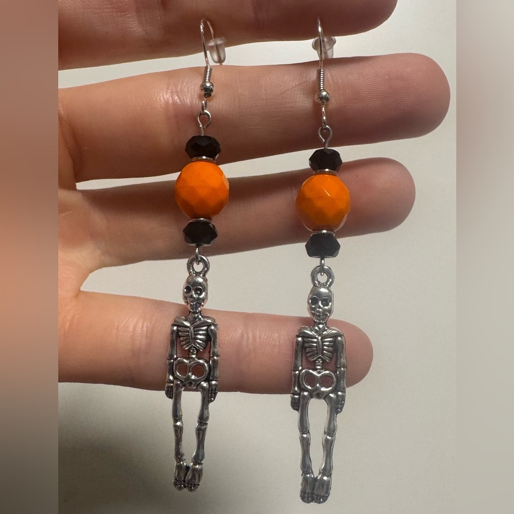 Silver Skeleton Earrings with Orange Beads